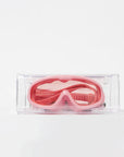 Rózsaszín gyerek úszószemüveg átlátszó tokban, fehér háttérrel