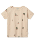 Bézs rövid ujjú gyerek póló barack mintával, prémium pamut anyagból.