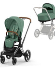 Modern zöld multifunkciós babakocsi barna fogantyúval, babahordozóval