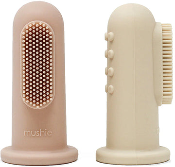 Mushie® Ujjra húzható szilikon fogkefe -Shifting sand/blush