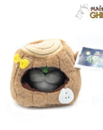 Totoro plush in a tree trunk - My Neighbor Totoro